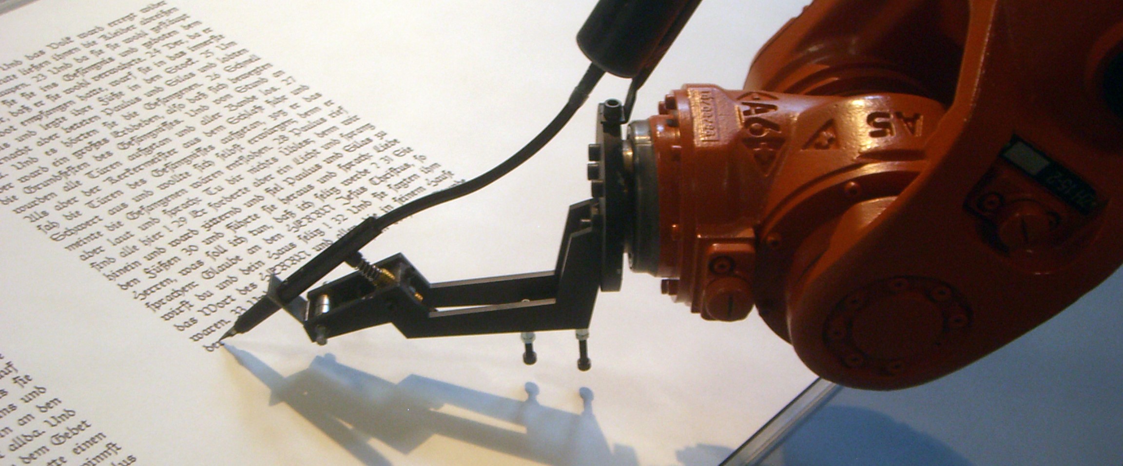 robot writing manuscript
